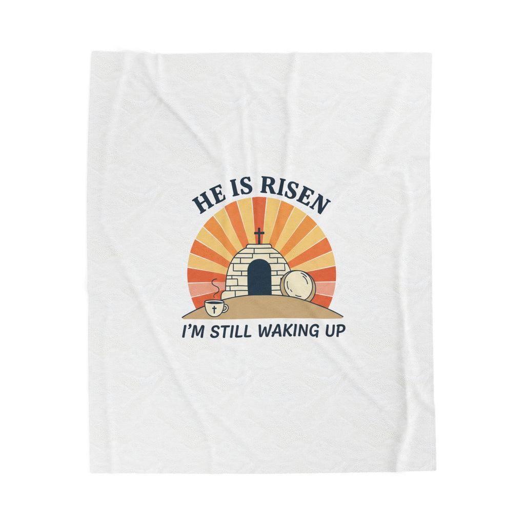 White t-shirt with 'He is Risen, I'm Still Waking Up' graphic design on a white background