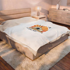 Bed with a decorative pillow featuring a lion design in a bedroom setting.