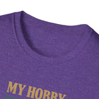 Close-up of a purple shirt with 'MY HORRY' text in yellow.
